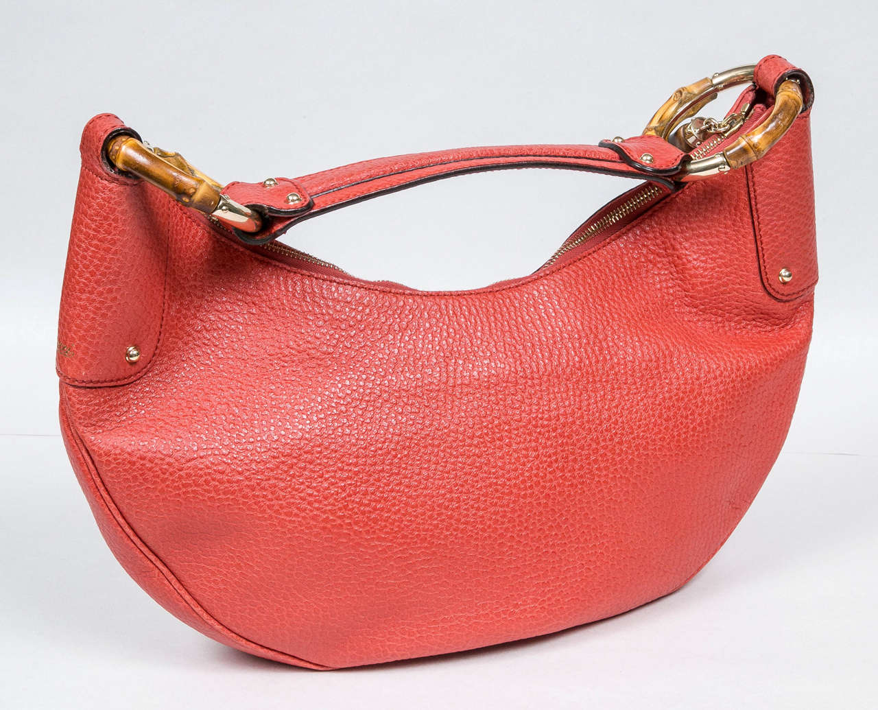 Rare color pebble leather purse with bamboo accents. Comfortable and elegant.