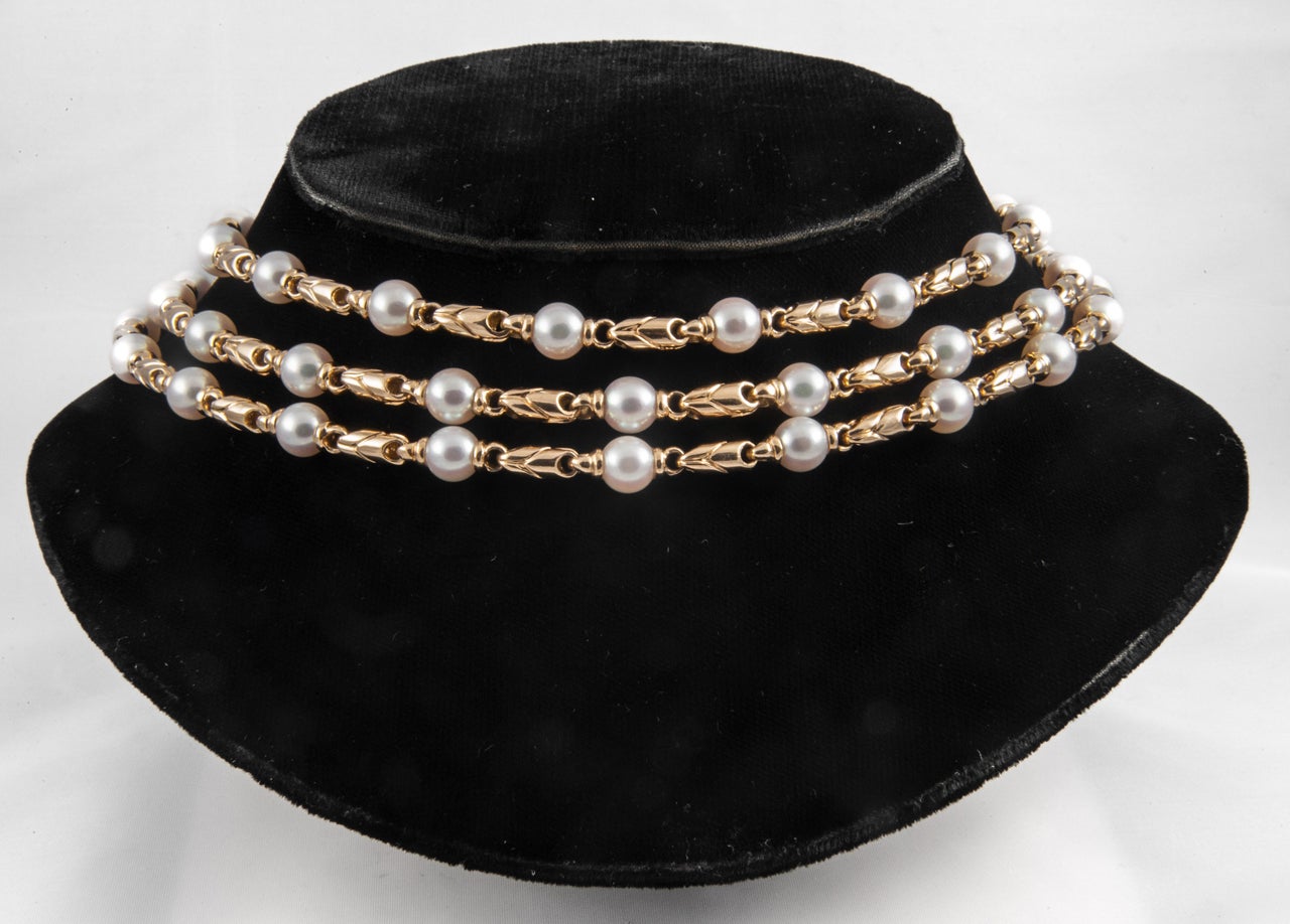 Bulgari signed,cultured pearl and gold,three row necklace