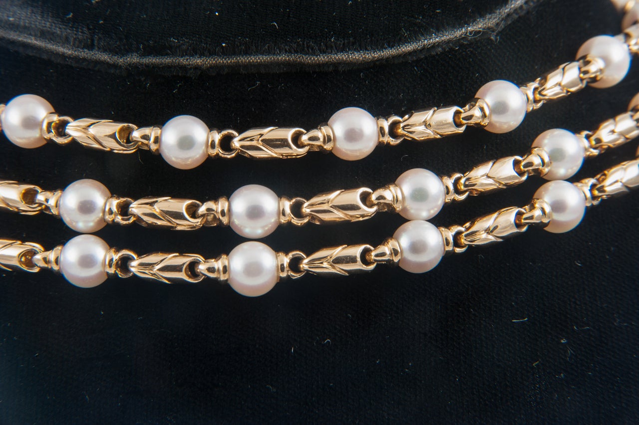 Women's heavy gold and cultured pearl necklace