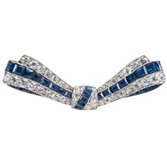platinum mounted, sapphire and diamond bow brooch, c, 1930