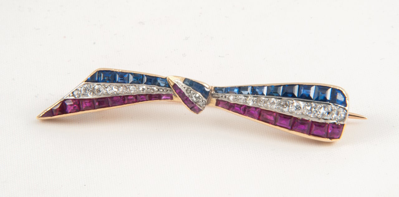french,diamond,sapphire and ruby tied ribbon brooch,