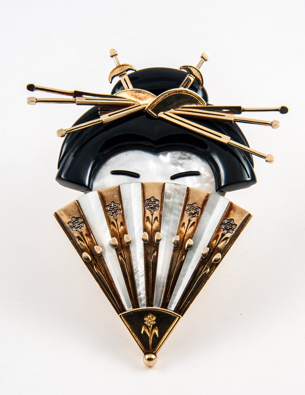 Unique onyx, mother of pearl and diamond Geisha girl clip brooch.