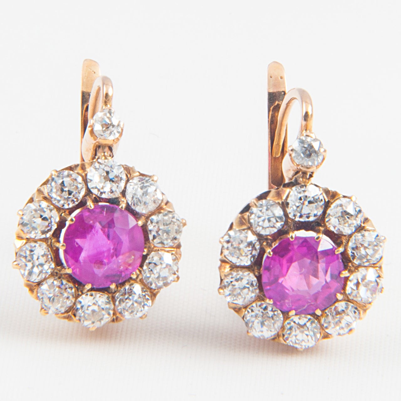 Pink Sapphire and Diamond Cluster earrings with hook and clip fitting. Old cut Diamonds.