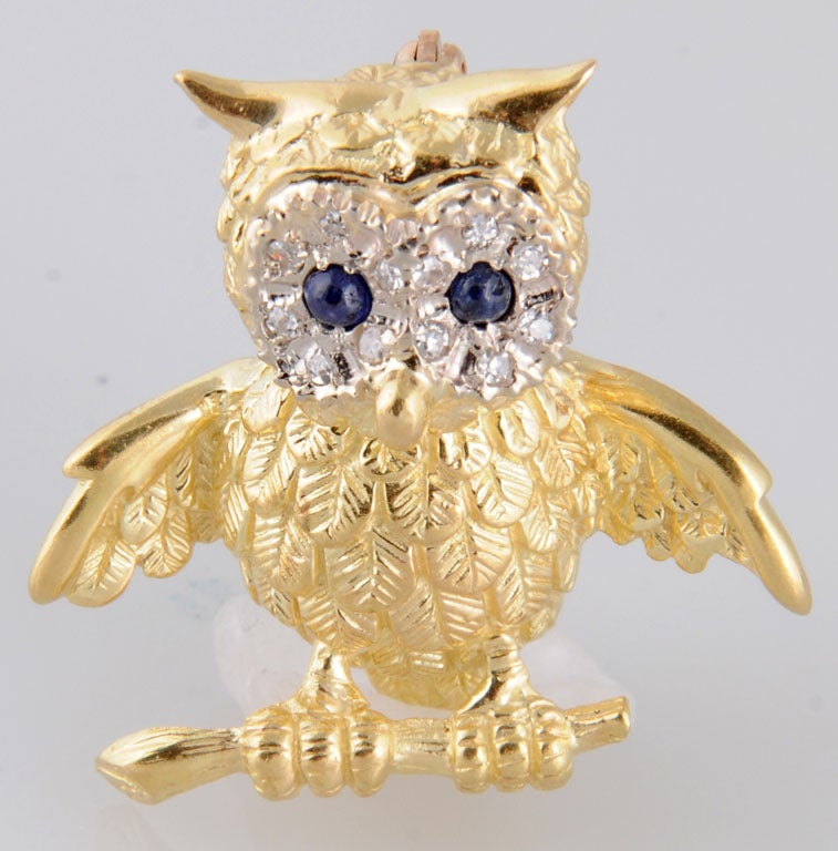 This little guy is beautifully made in 18k yellow gold.