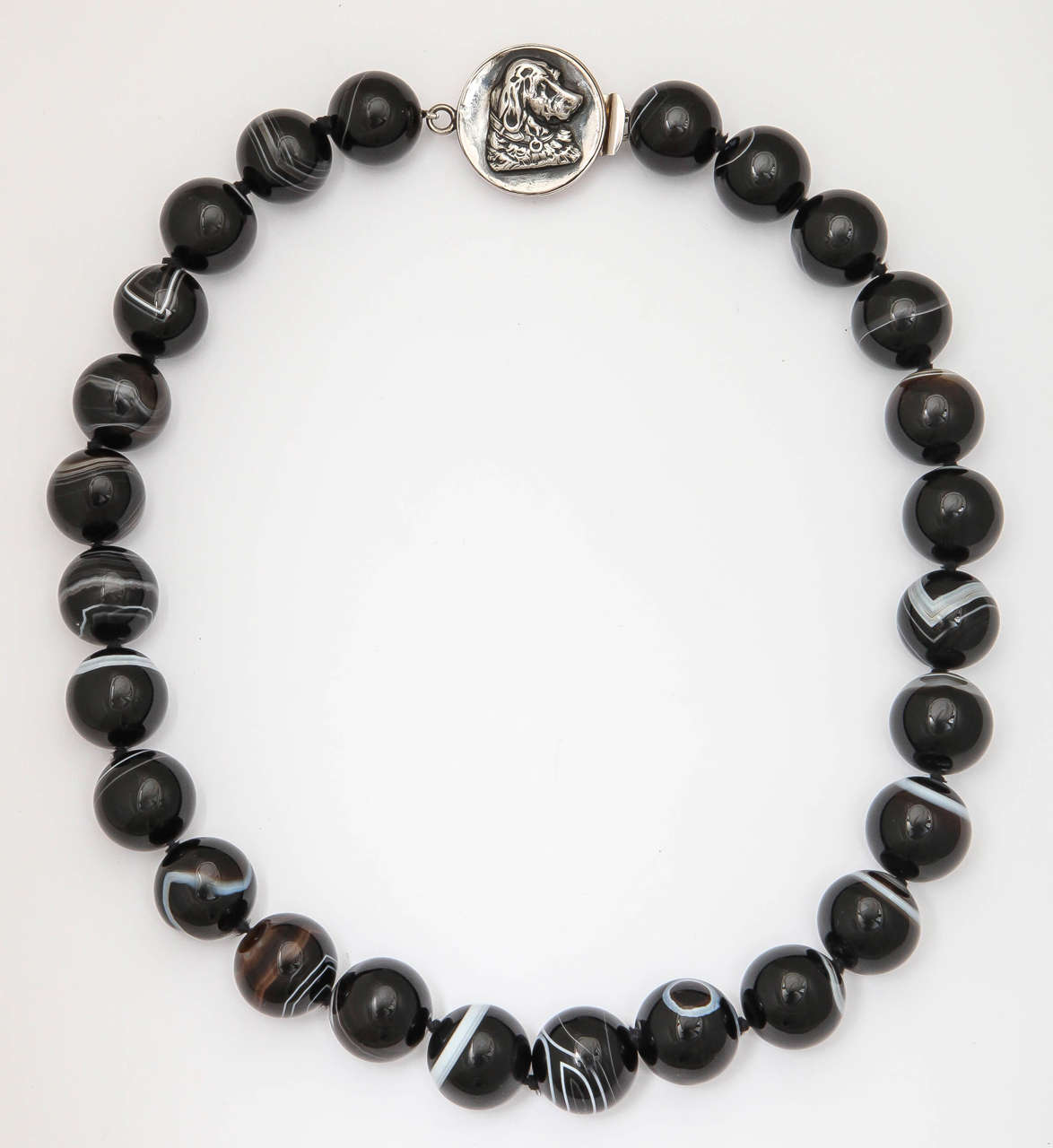Large striped Agate Beads - victorian - combined wit an antique associated Sterling Silver clasp of a dog in profile.