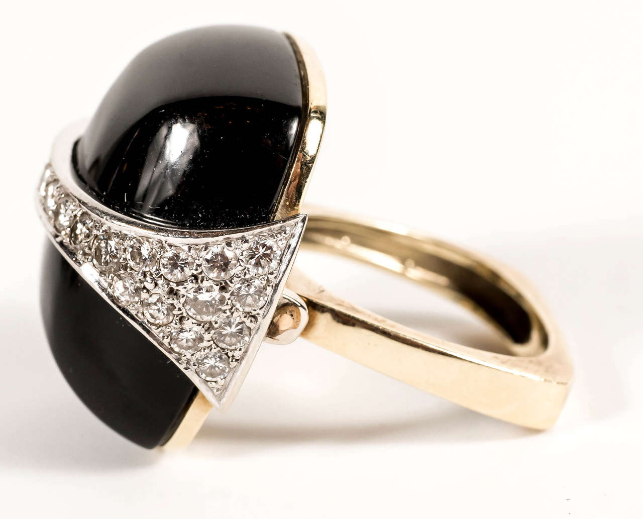 Modernist Strong and Bold 1970s La Triomphe Black Onyx Diamond Gold Ring