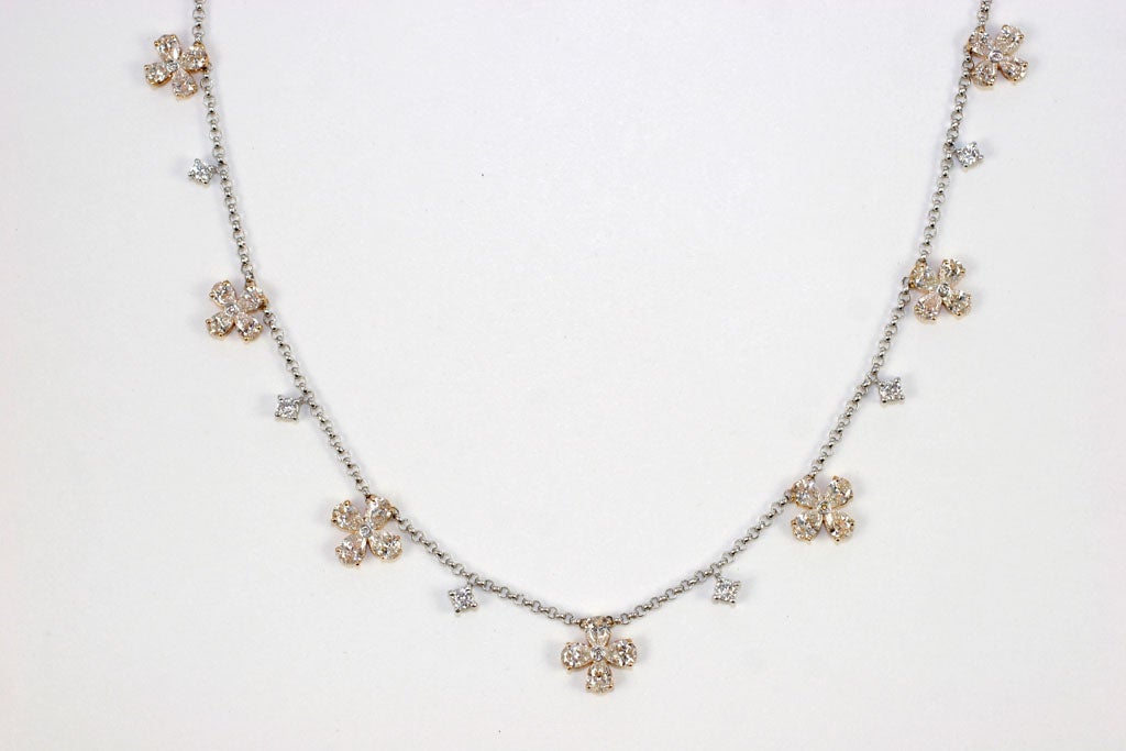 18 k diamond clover necklace set in pink gold