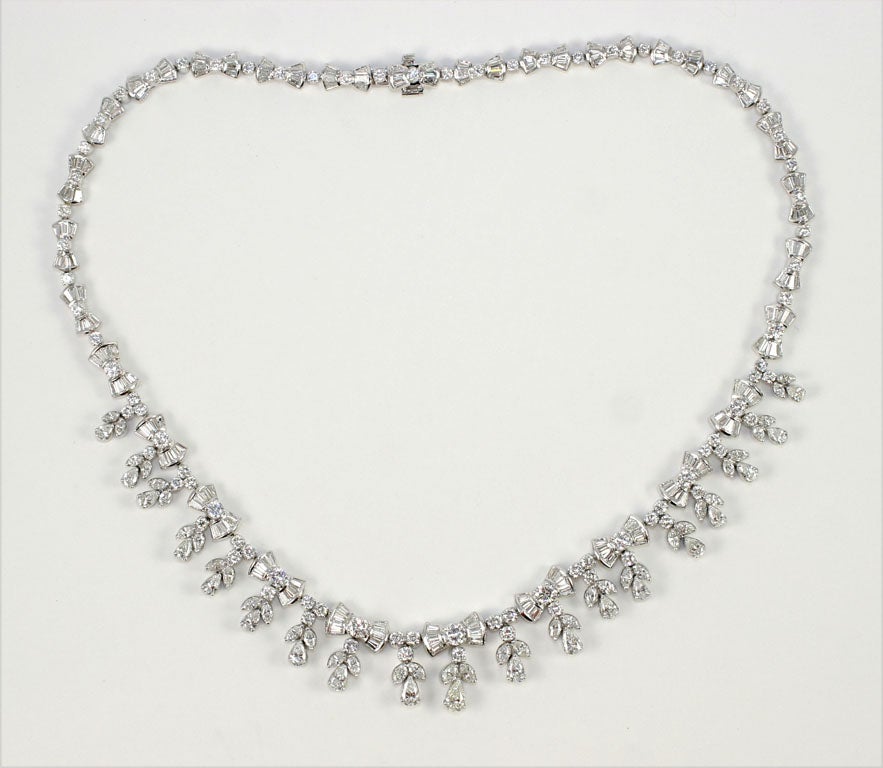 Platinum Diamond Baguette and Pear Shaped Bow Necklace with 18.64 total weight in Diamonds