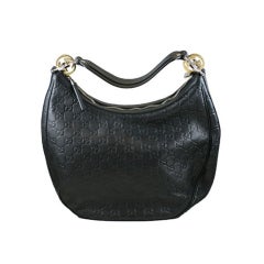 Brown Gucci Embossed Leather Bag