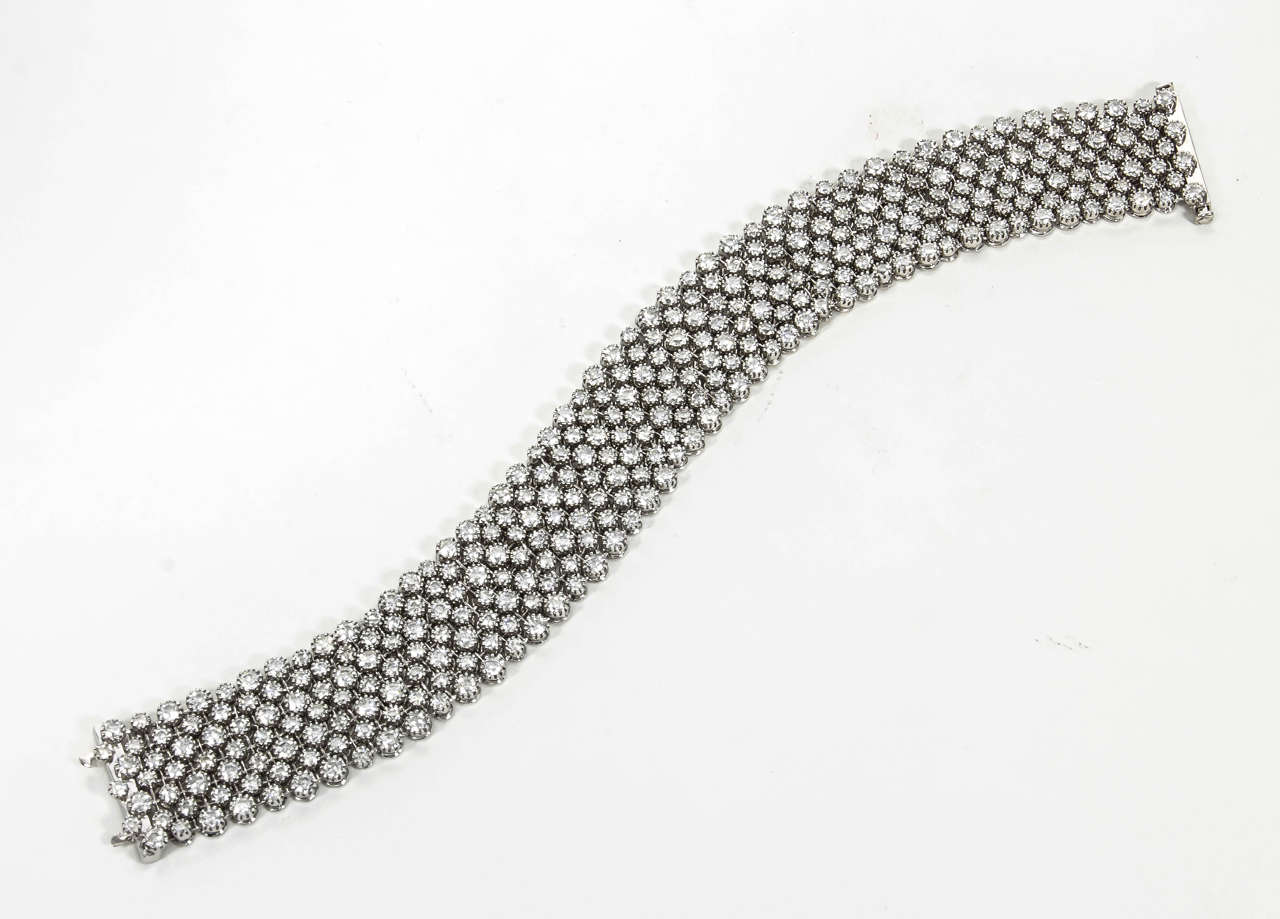 A beautiful and classic bracelet in a unique mesh design. 

19.44 carats of F-G color VS clarity diamonds set in 18k white gold. 

3/4 of an inch wide