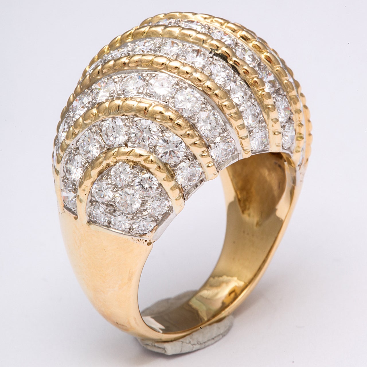 Large Diamond Dome Ring set on the Diagonal  & separated by rope elements.  Over 5cts Total - clean full cut White Diamonds