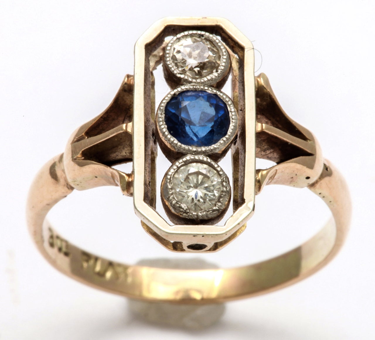 A ring for a child or  the pinky that is small, I thought, as It fit my little finger, but it was enduringly lovely and has entranced me by its sweet character for the last week. With its 5 pt. old mine diamonds and 10pt admiral blue sapphire, the