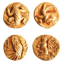 Set of Four Line Vautrin Gilt Bronze Buttons
