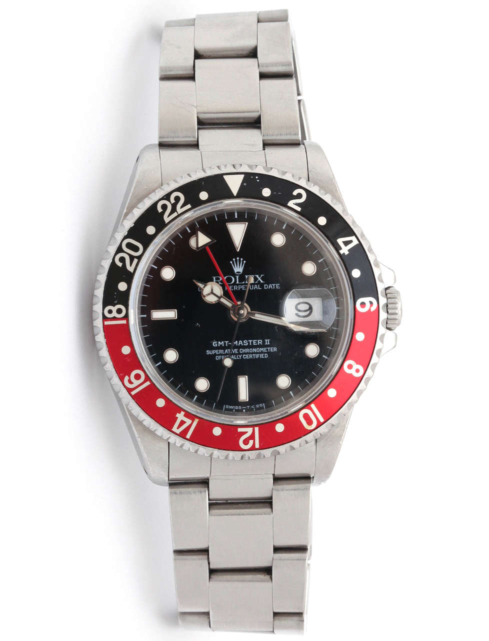 An Iconic Rolex GMT 'cherry coke' version with a red and black second time zone bezel, as opposed to the more traditional blue and red colour.  The watch is in good, fully original, unpolished condition and is accompanied by the original sticker on