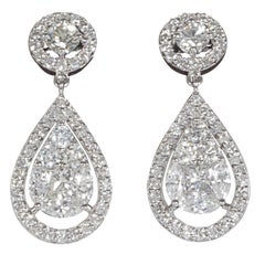 Boucles d'oreilles pendantes élégantes en diamants avec illusion