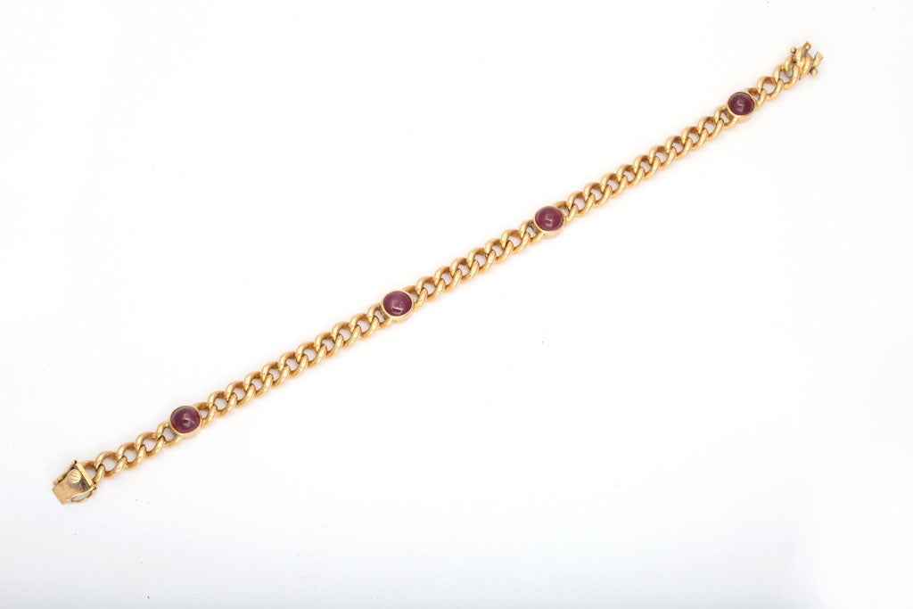 Chic Flat Curb Chain Bracelet - bezel set with Cabochon Burmese Rubies.