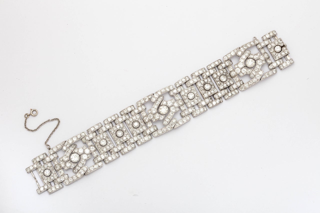 This exquisite diamond bracelet signed and numbered by Cartier contains approximately 35 carats of diamonds. The diamonds are set in Platinum.