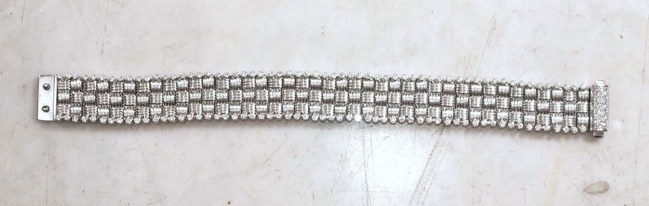 Unusual 18k White Gold and Diamond Apassionata Bracelet Bordered with 120 diamonds and signature clasp.1.5 carats