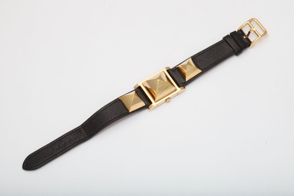 Hermes Medor Watch. Black belt with gold studs.
Width 1 inch. total length 8.5 inches.