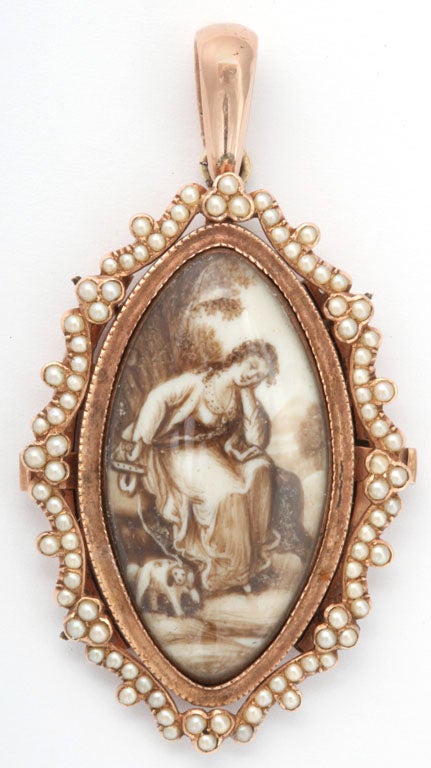 The subject is romantic.  The pendant is extremely beautiful  Surrounded by rhythmic garlands of natural pearls and a gold oval frame is a portrait on ivory that is curved in the Georgian manner.  In sepia,  a dreamy young woman with long curly hair