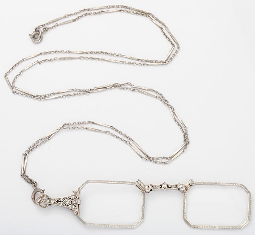 Elegant Platinum & Diamond Lorgnette in deco style.  Just what you need to read a menu or theatre Program.