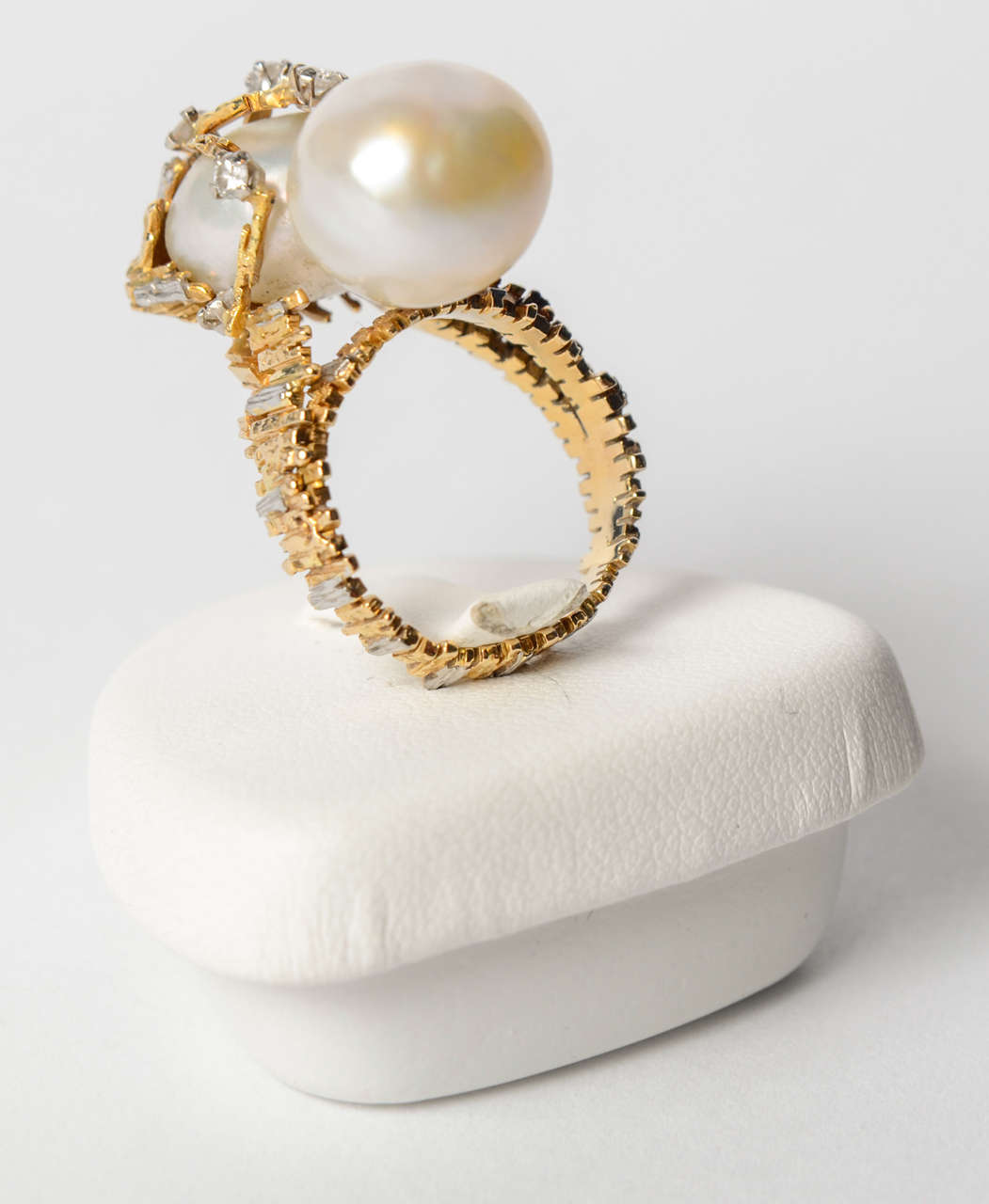 Yellow and white gold ring with diamonds and big cultured pearl, circa 1970.