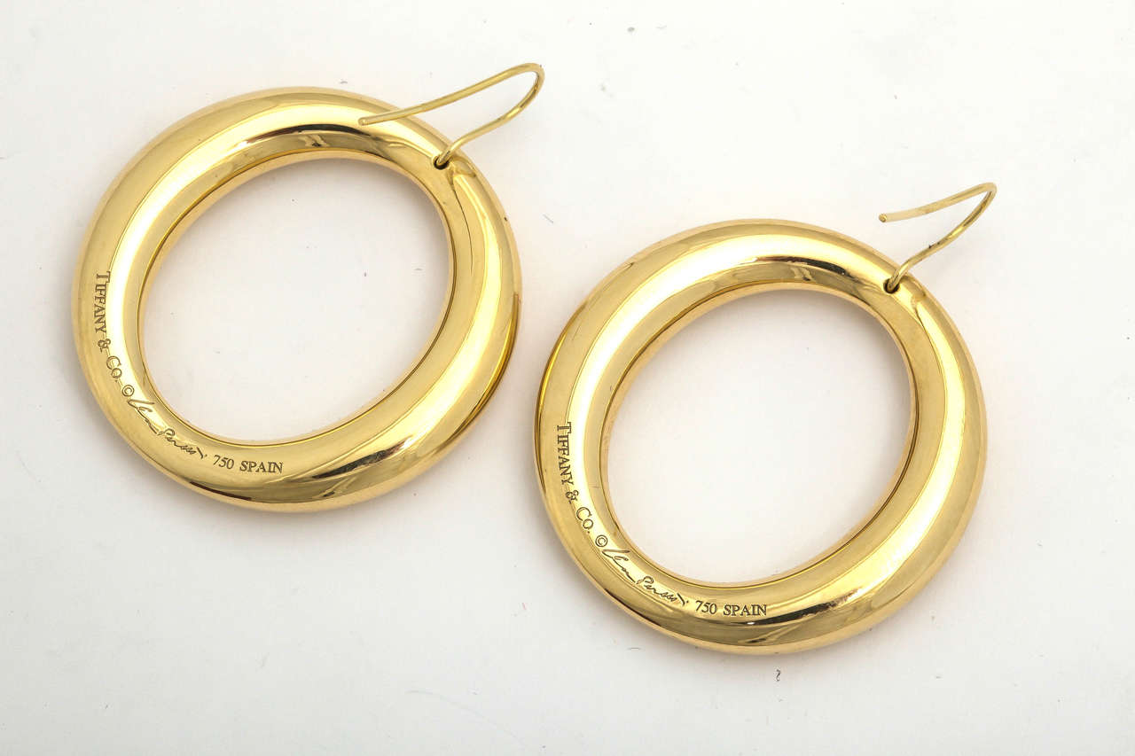 18KT High Polished Yellow Gold Large Frontal Hanging Hoop Earrings 
For Pierced Ears Only
Designed by Elsa Peretti for Tiffany & Co.
Made in Spain
