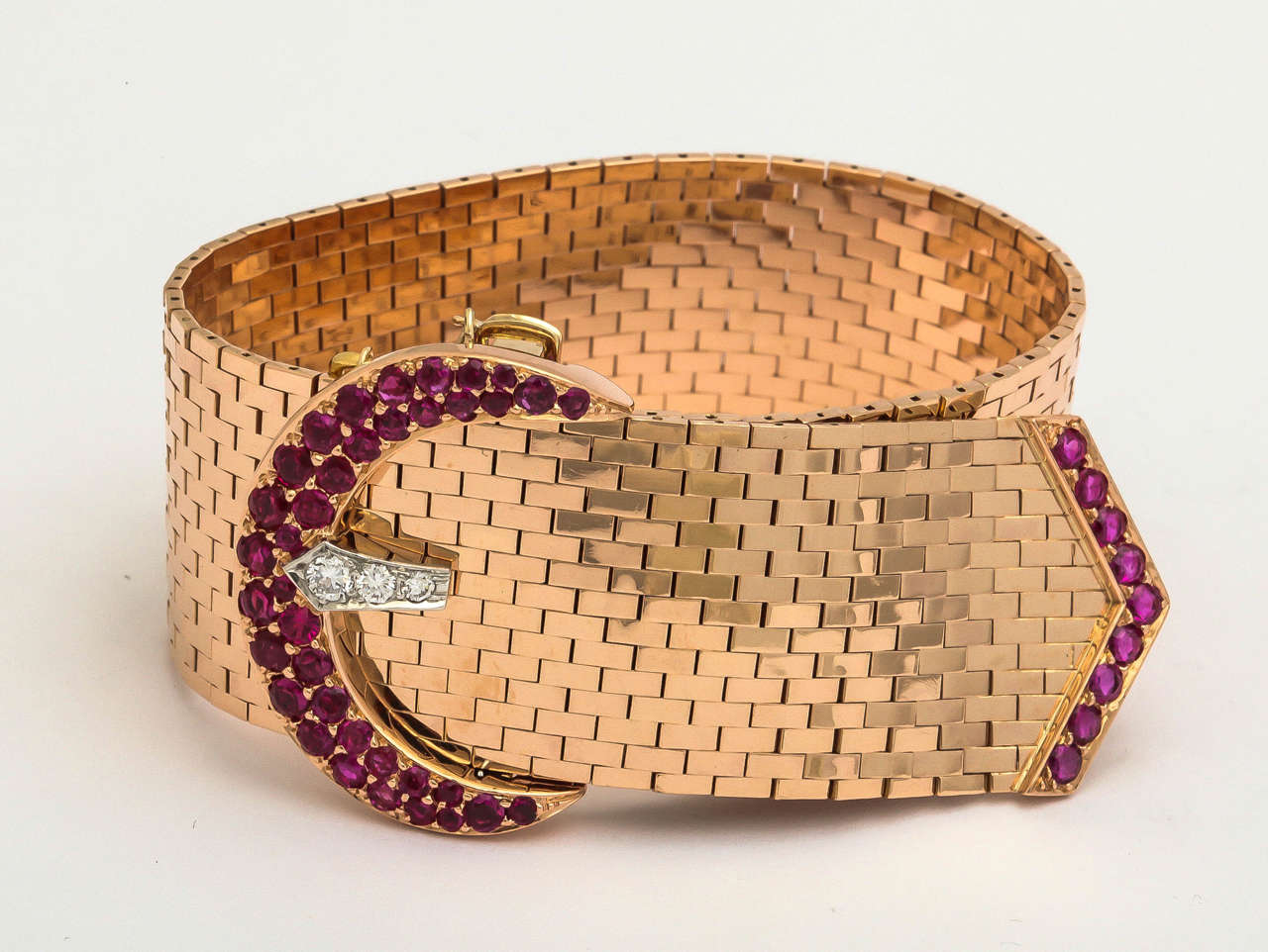 14 KT Rose Gold Brick Mesh Belt Buckle Bracelet Designed in a Highly Flexible Mesh Design Embellished with Numerous Faceted Round Cut Rubies Weighing Approximately 3 Carats & 3 High Quality Full Cut Diamonds Weighing Approximately .50