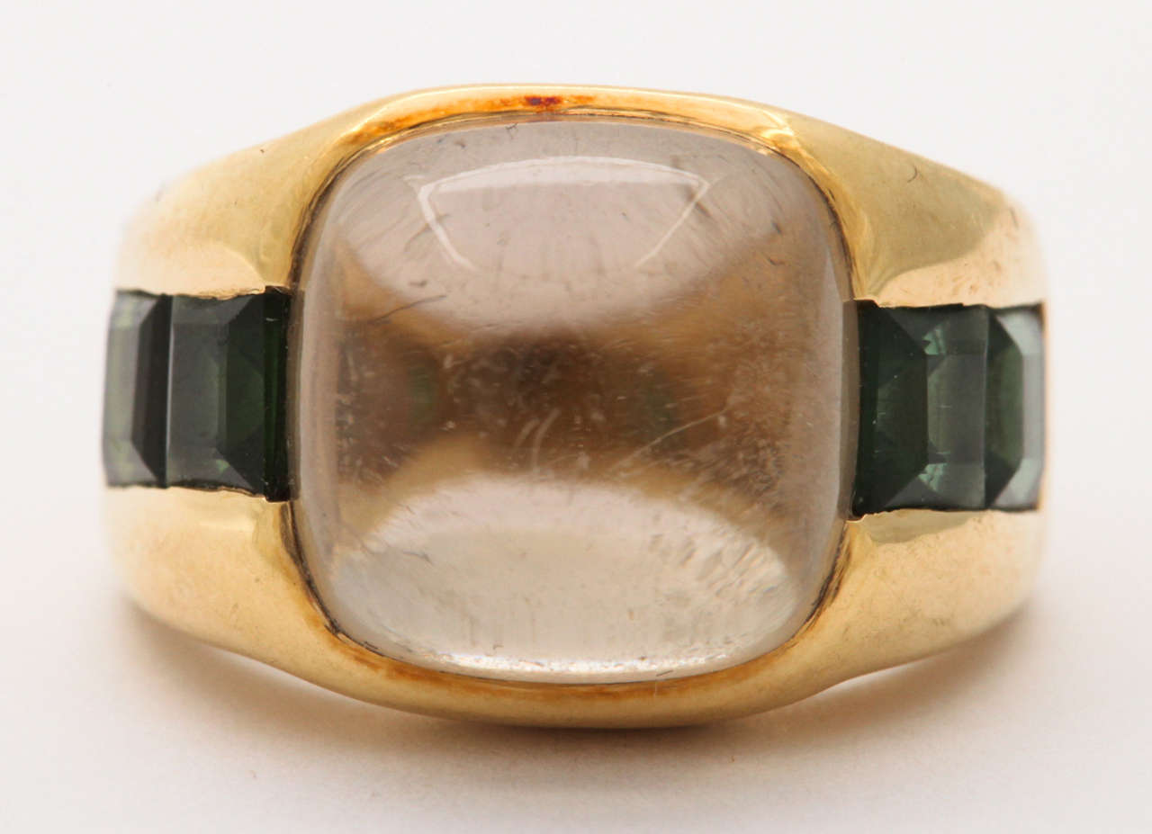 18t Yellow gold Ring set with Cabochon center Citrine stone & flanked by graduated & faceted Green Tourmalines.  Ca 1960.  Great as a Pinky ring for a man or a woman.  Great style statement.