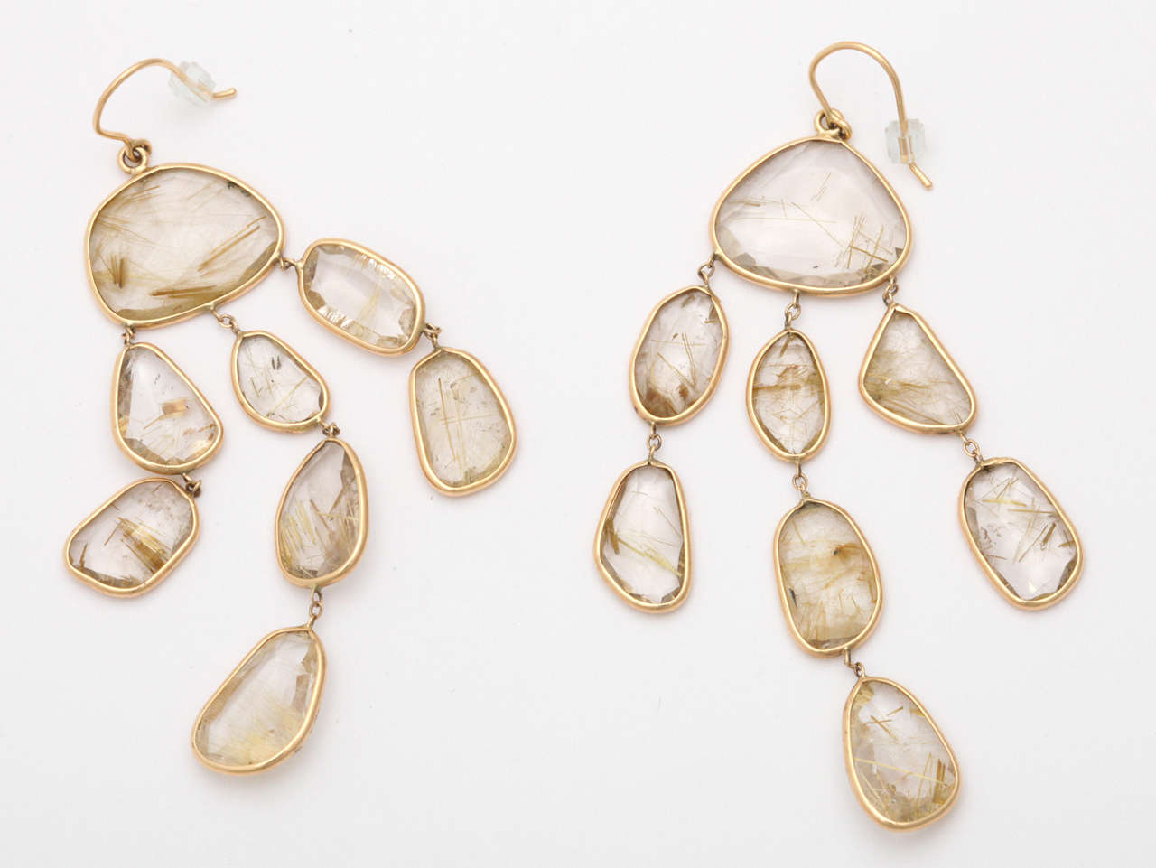 Fabulous Faceted & rutilated Topaz quartz Earrings set in 18kt Yellow Gold Wire work.