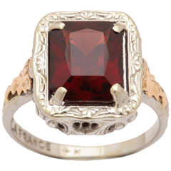 Passion Sparkles in a Garnet and Gold Ring