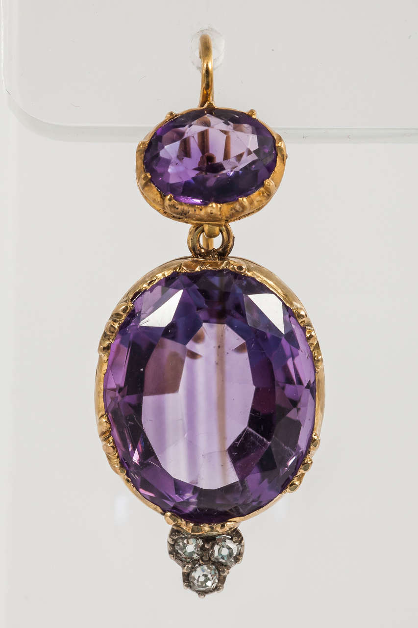 Stunning Amethyst and Diamond drop earrings set in 15ct Gold