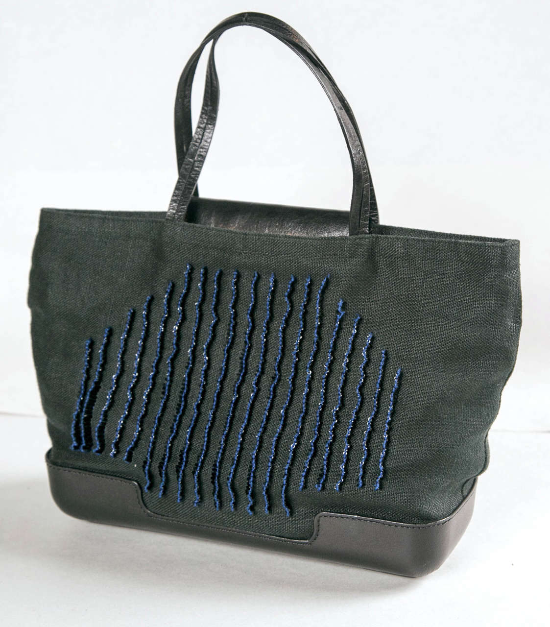 Unusual black textile Bottega Veneta purse with black leather accents. It features eye-catching blue and black bead work.