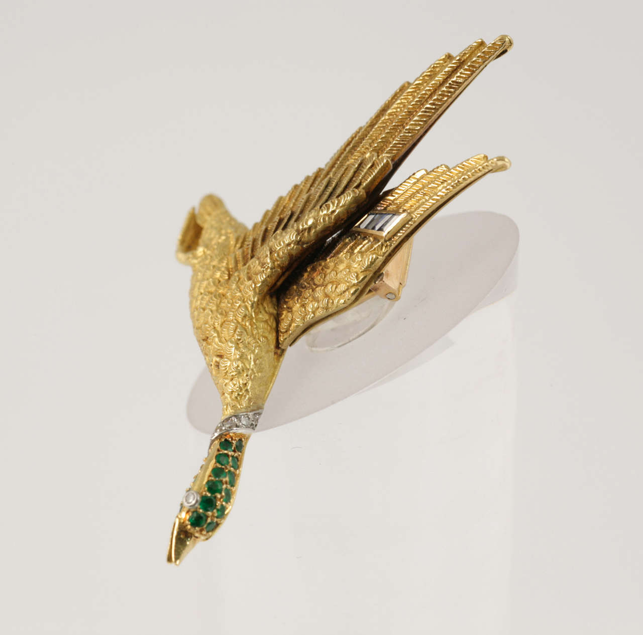 18kt Gold Flying Goose pin set with Emeralds, Sapphires and Diamonds