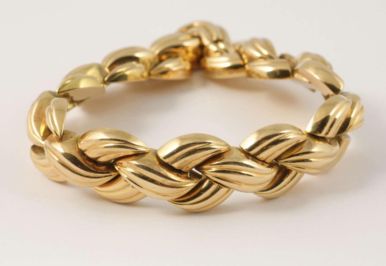 18kt Gold basket weave bracelet with an extra clasp to elongate.