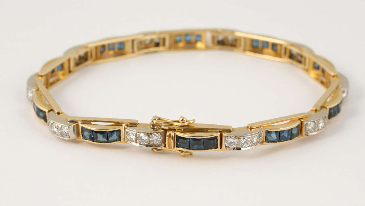 18kt Gold Bracelet set with natural Sapphires and Diamonds.