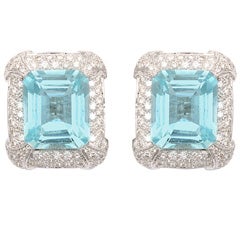 Pair of Aquamarine, Diamond and Platinum Retro clip earrings