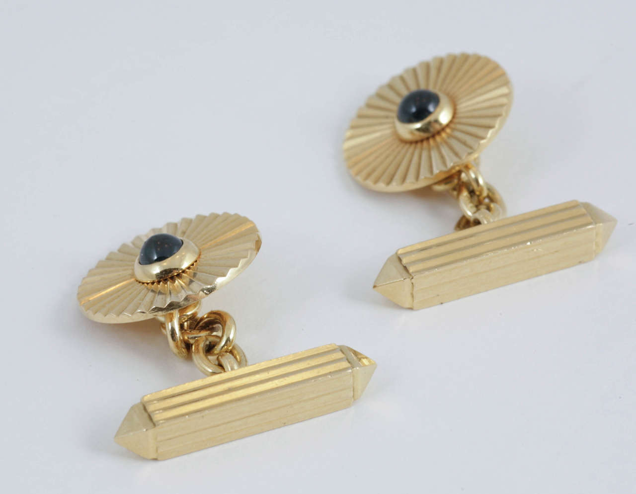 Pair Of Heavy Gold Cufflinks With Torpedo Terminal By Cartier With Cabochon Sapphire. Cartier Case, c,1960