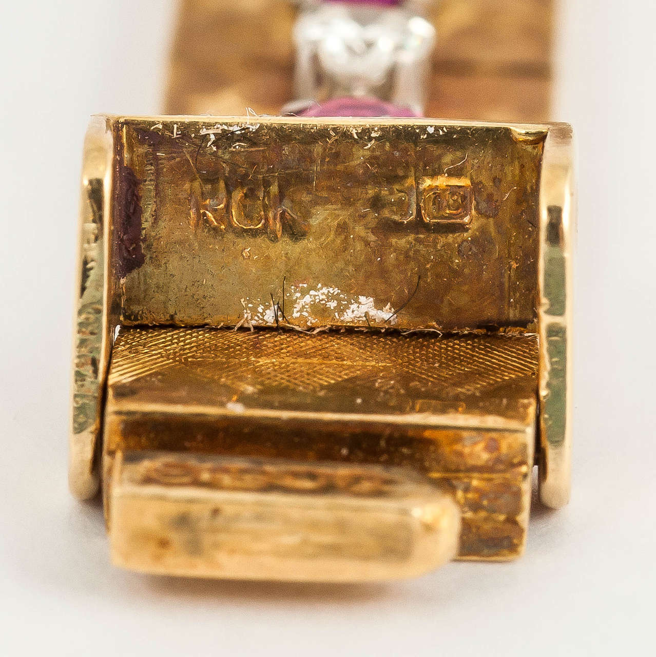 Round Cut Vintage Bracelet in 18 Carat Gold, Burma Rubies & Diamonds, English circa 1965 For Sale