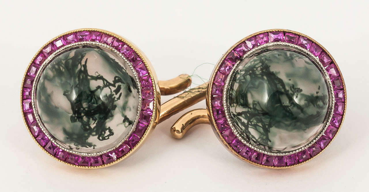 Fine pair of Austrian made double sided cufflinks with a moss agate centre, with well matched Burma rubies surrounding. Mounted in 15 ct gold with Austrian marks, probably Viennese c 1930