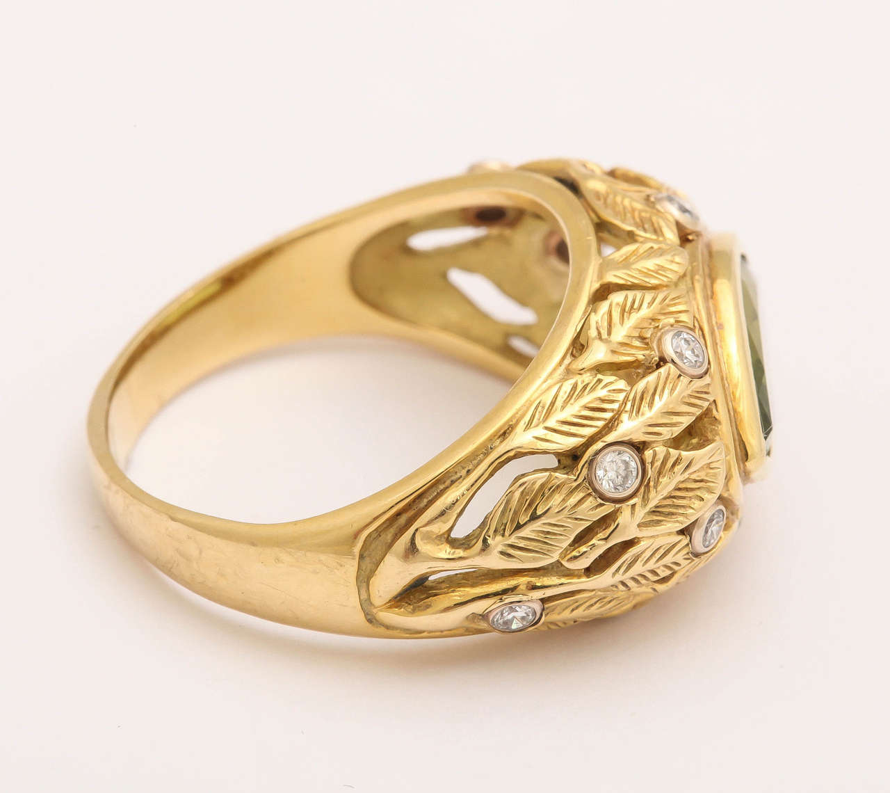 Marquise Cut Peridot Marquise Carved Leaf Design Ring
