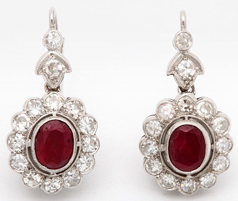 platinum and ruby and old european cut diamond cluster earrings