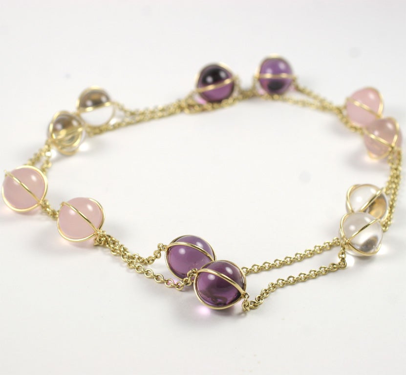 18kt Yellow Gold Long chain Necklace with Amethyst, Rose Cuartz and Crystal Balls surrounded by gold encasement 38