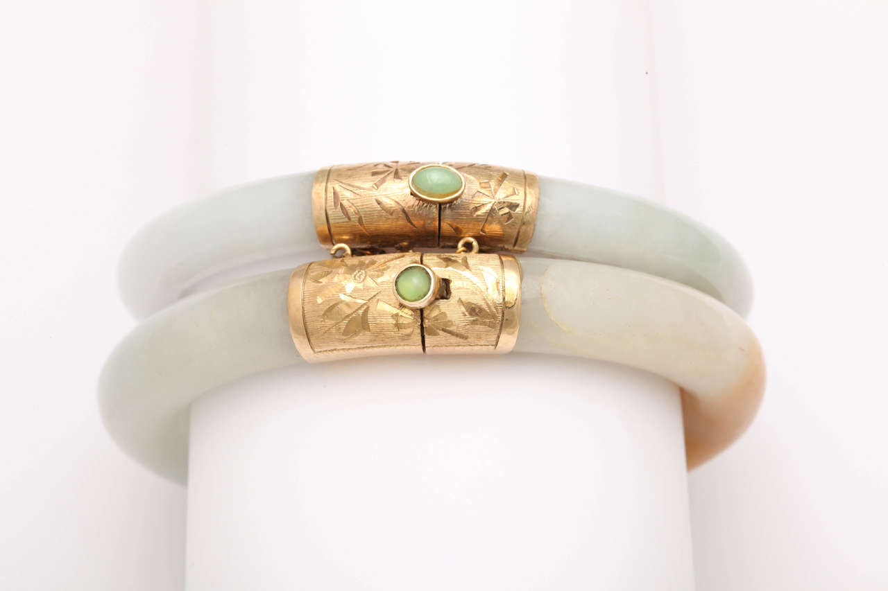 Pair of Modern Jade Bangles with Engraved Jeweled Clasps 1