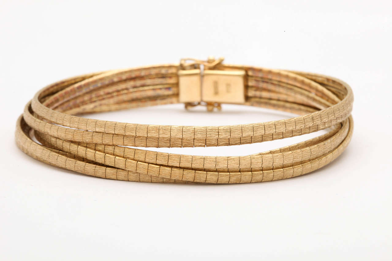 14kt Yellow gold segmented spaghetti band link Bracelet  Match to 8 strand necklace.  Also - casual, dressy & very wearable.  Ca 1980