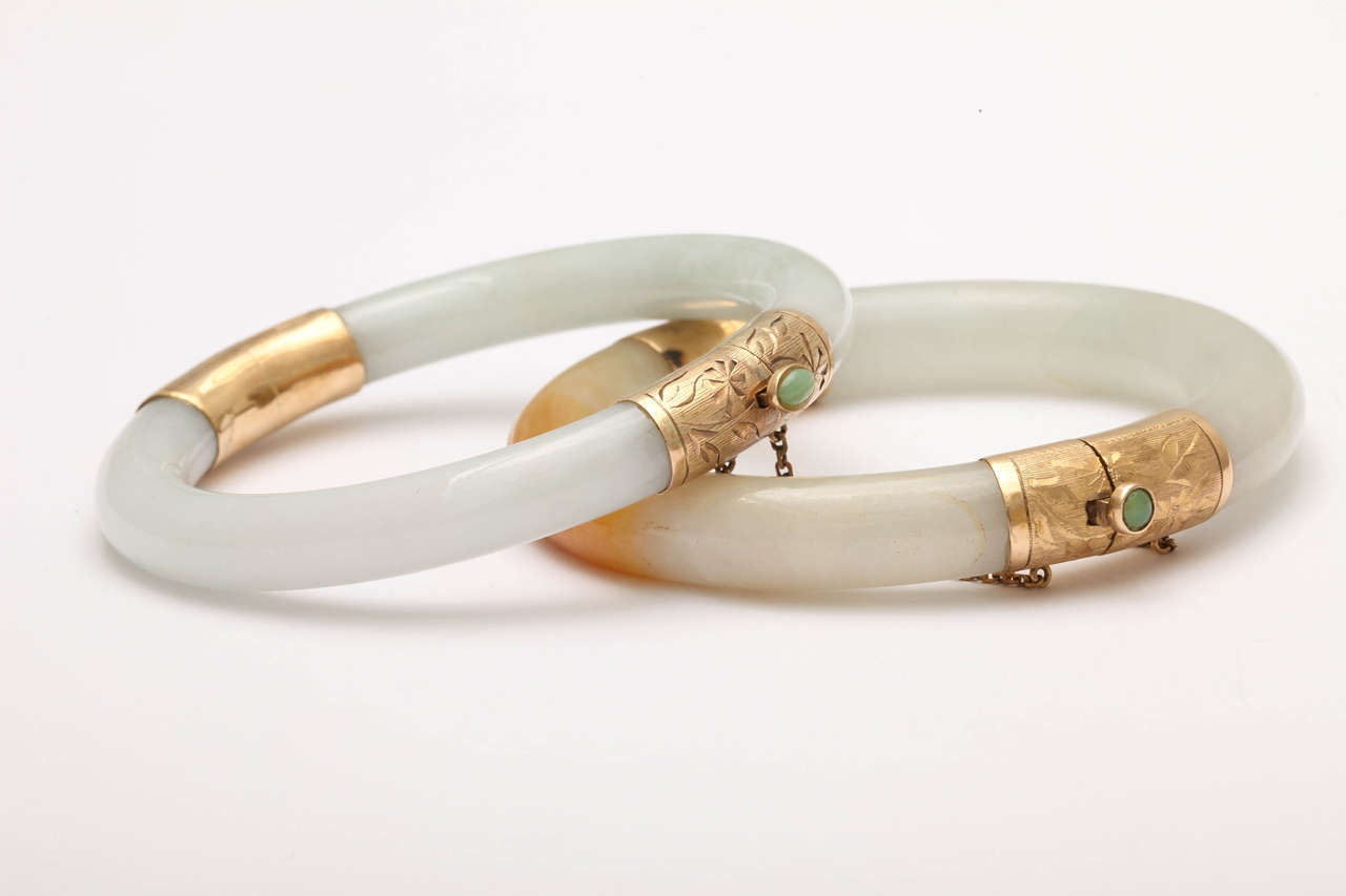 Pair of Modern Jade Bangles with Engraved Jeweled Clasps at 1stdibs
