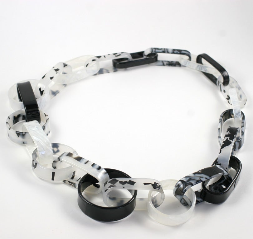 Black and white, round and oval large link lucite necklace.
