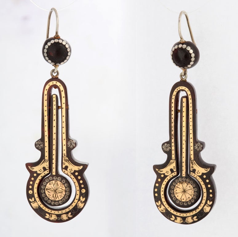 Pique jewelry made an appearance in England and France during the English Victorian period, c.1870.  This pair of earrings is a beautiful example of the art of pique work with a generous amount of inlaid gold that was all done by hand.  Creating