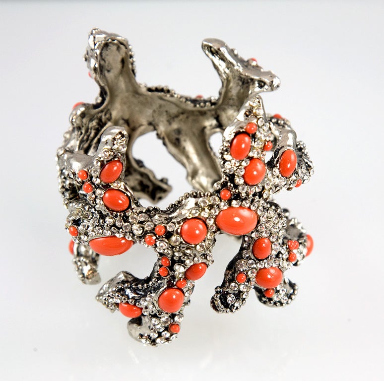 Stunning and impressive Runway cuff from the House of Valentino.  This is from the same season as the earrings listed this week.  This cuff is decorated entirely all the way around.  Set with glass 