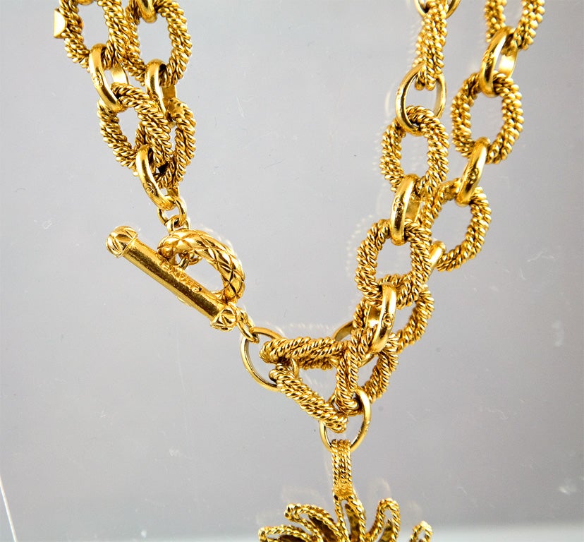 Women's Gold Tone Sun Burst Pendant and Chain by Chanel